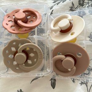 4 pacifiers - NEW - 2 bibs and 2 itzy ritzy